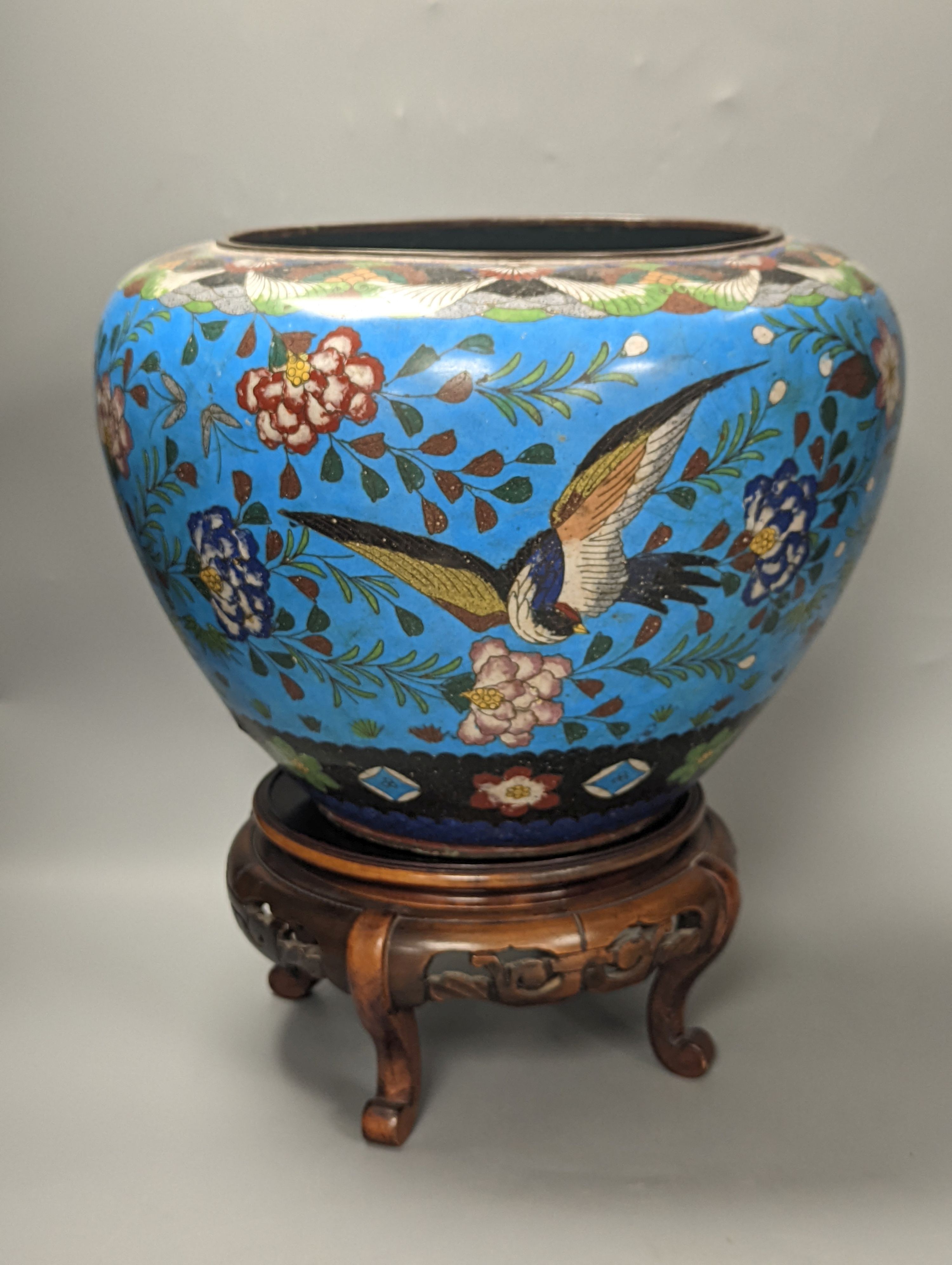 A large Japanese cloisonné enamel bowl on stand and a similar champleve enamel 2 handled vase, Cloisonné bowl and stand 36 cms high.